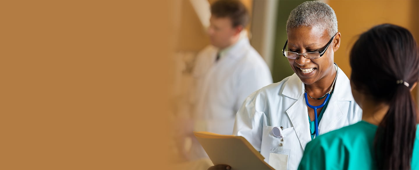 Doctor and nurse talking