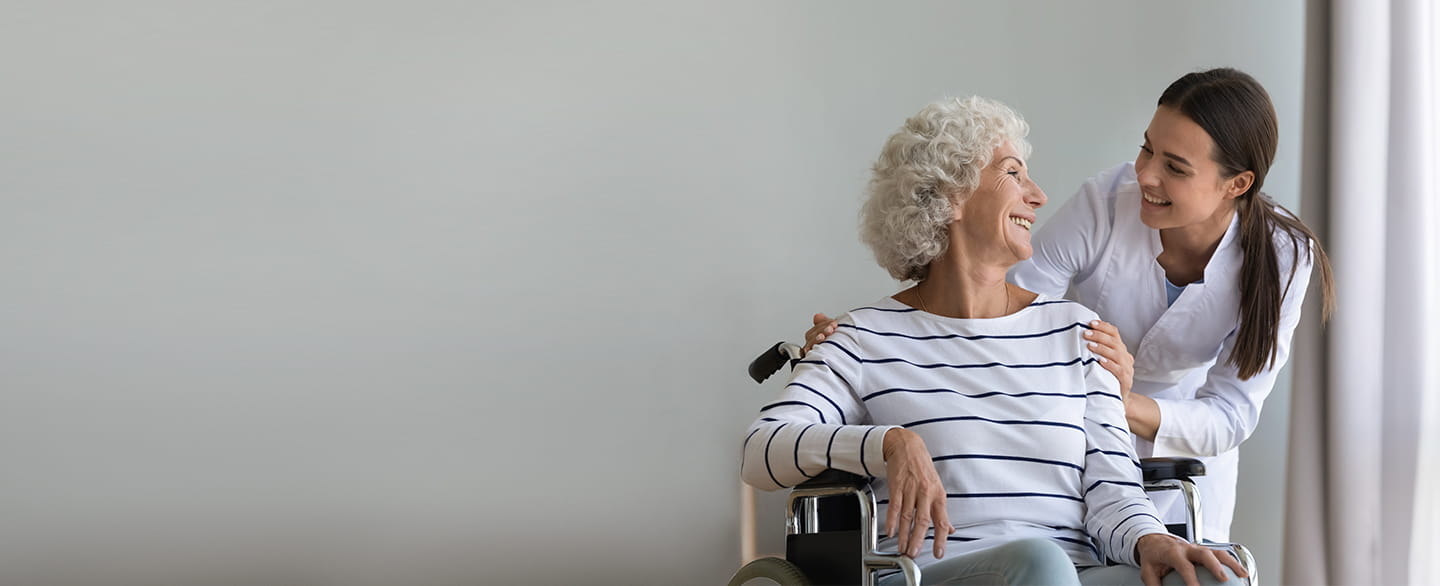 Doctor with patient in wheelchair. 