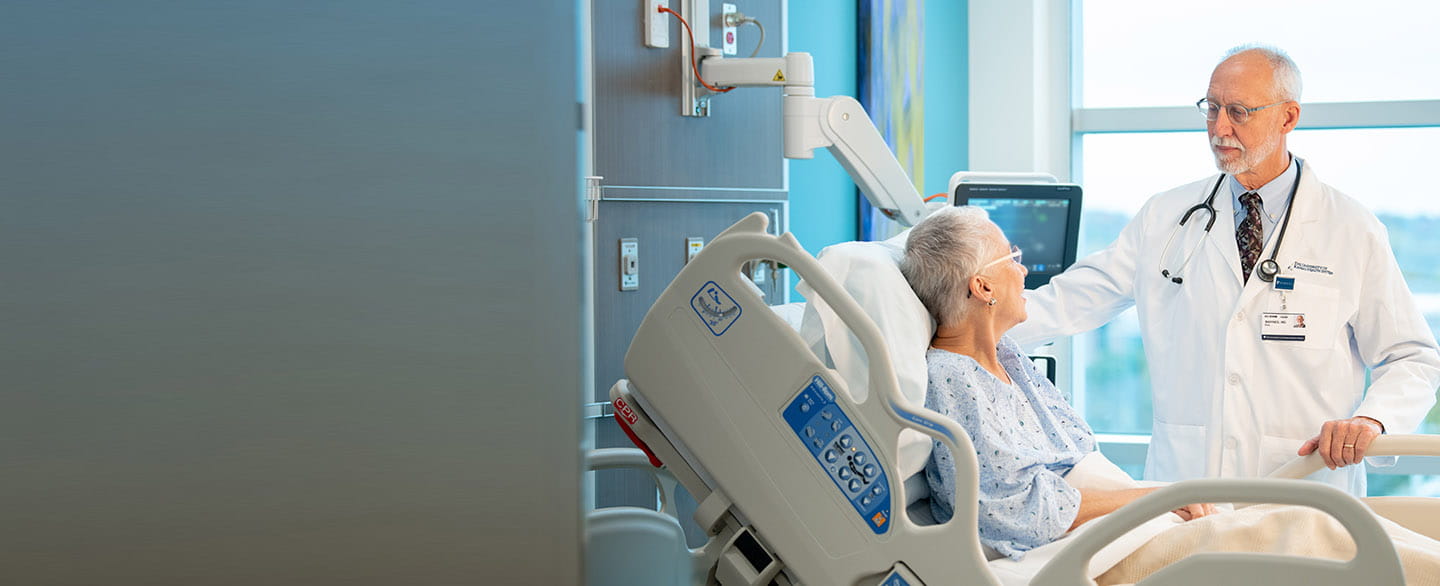 Doctor visiting with patient.