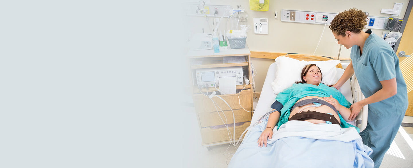 Anesthesiologist speaking with patient