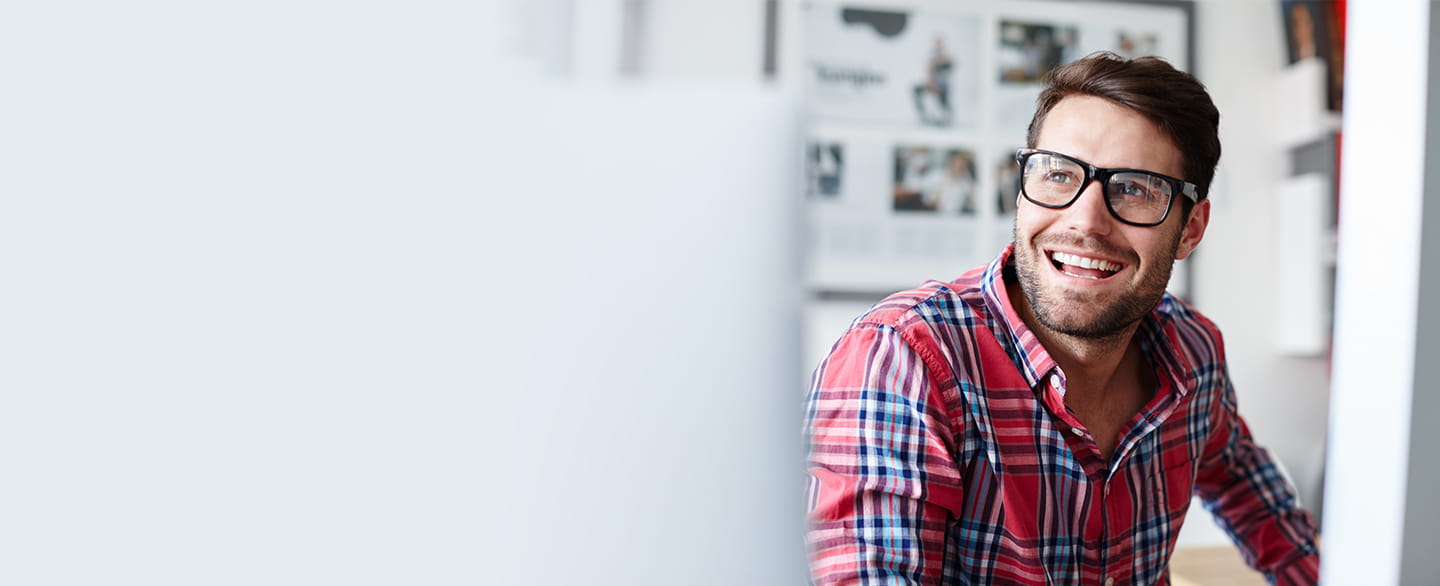 Happy man wearing glasses.