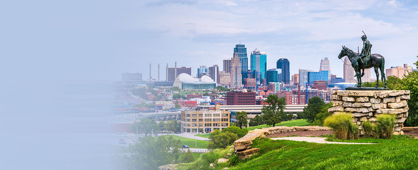 Downtown Kansas City skyline with The Scout statue. 