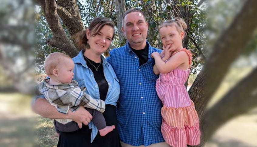 Dr. Milner and her family smiling in a family photo