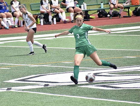 Jessica Baker playing soccer