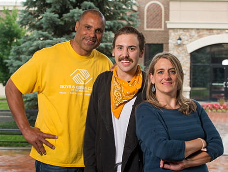 Luka Still with his parents.