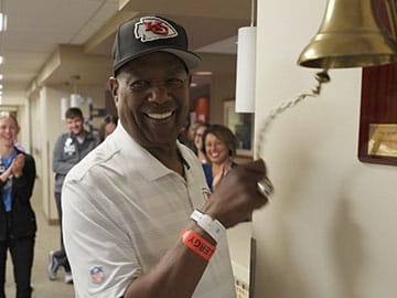 Ralph King ringing the bell