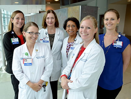 Certified Nurse Specialists smiling. 