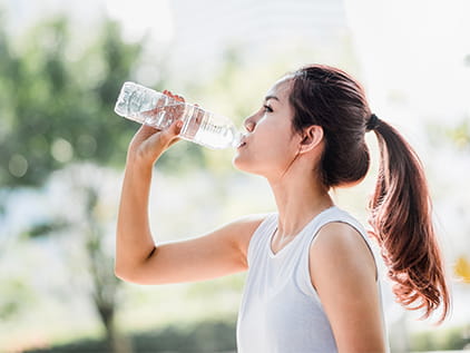 Athlete drinking water
